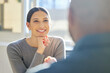 © D Lahoud/peopleimages.com - Absorbing all the knowledge she can. an attractive young businesswoman listening attentively to a colleague during a meeting.