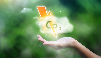 Wall Mural - lightning and co2 cloud symbol in hand