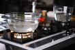 © boomeart - Water boiling in borosilicate glass casserole on gas stove