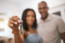 Happy Couple, Hands And Keys For Real Estate Purchase, Property Or Homeowner With Mortgage Loan Or Finance. Hand Of Woman And Man Realtor Holding Key To House, Moving Or Sale For New Home Investment