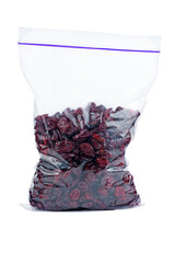 Wall Mural - Some dried cranberry in plastic packet isolated on white background