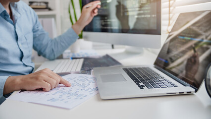 Wall Mural - programming developing software application. programmer writing program code with two monitors and w