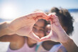 © Azeemud-Deen Jacobs/peopleimages.com - Happy, outdoor and girls with heart hands, support and wellness on break, relax or bonding. Friends, young people or children with happiness, symbol for love or emoji with care, solidarity or outside