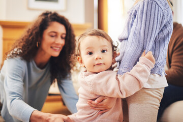 Poster - Portrait, family and baby with wellness, support and happiness at home, relax and fun. Face, child and infant with a smile, cheerful and quality time with bonding, parents and toddler in living room