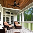 6 A covered porch with rocking chairs, a porch swing, and a ceiling fan2, Generative AI
