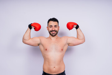 Young caucasian handsome man isolated on white background with boxing gloves