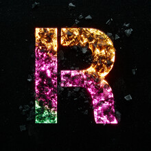 High Quality Photo Of Multicolored Gradient Neon Colors Capital Letter R On Black Textured Background With Black Stones.