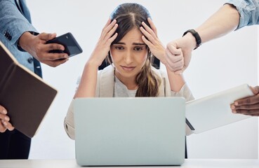 Wall Mural - Im feeling so trapped today. Shot of a young businesswoman looking stressed out in a demanding office environment.