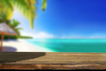 Wall Mural - Desk of free space and summer beach background 