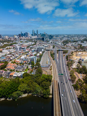 Poster - Vertical aerial shot of highway connecting to Perth CBD in Australia