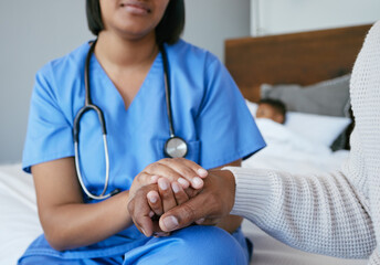 Poster - Im here to help you through this. Shot of a nurse comforting a man at home.