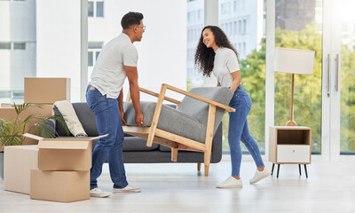 Sticker - It can go right here. Shot of a young couple moving into their new house.