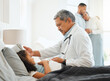 © K.A./peopleimages.com - Lets figure out the problem. Shot of an unrecognizable doctor checking a sick little girls temperature at home.