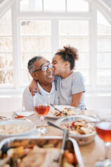 Wall Mural - She gives the sweetest kisses. Shot of a young girl kissing her grandfather on the cheek during lunch.