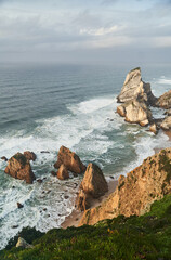 Wall Mural - The cliffs of Cabo da Roca, Portugal. The westernmost point of Europe. Ursa beach at the wester coast of Portugal.