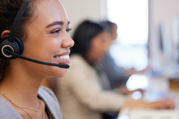 Fototapete - Friendly is the approach we always take. Closeup shot of a young call centre agent working in an office.