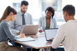 © Michael C/peopleimages.com - Lets get this meeting started. Cropped shot of a group of businesspeople having a meeting in the boardroom.