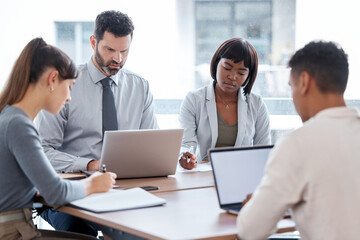 Fototapete - Meeting in session. Cropped shot of a group of businesspeople having a meeting in the boardroom.