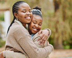 Wall Mural - The bond between mother and daughter. Cropped shot of an attractive young woman and her daughter embracing outdoors.