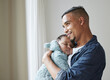 © Siphosethu Fanti/peopleimages.com - This is the best feeling. Shot of a young father embracing his baby at home.