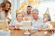 © Oostendorp/peopleimages.com - Time flies by, take every opportunity to celebrate it. Shot of a happy family celebrating a birthday at home.