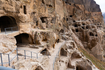 Wall Mural - Vardzia ancient cave city carved into the rock - a famous attraction of Georgia