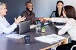 © Daiyaan P/peopleimages.com - Congratulations, you are this months top employee. Shot of businesspeople shaking hands during a meeting in an office.