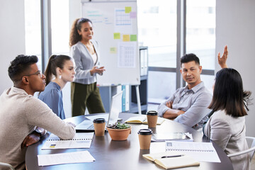 Canvas Print - Planned success. Shot of a young businesswoman giving a presentation.