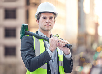 Wall Mural - Im here to do a complete rebuild. Cropped portrait of a handsome male construction worker standing with a hammer on a building site.