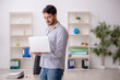 © Elnur - Young male student employee in tele-education concept