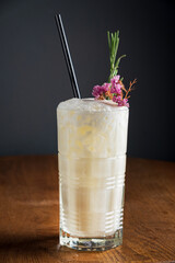 Canvas Print - cocktail with flowers on the wooden background