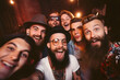 © Ricky - group selfie of trendy people at party, made with generative ai