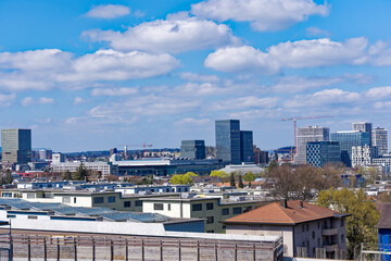 Wall Mural - Skyline of Zürich North with modern skyline seen from district Schwamendingen on a sunny spring day. Photo taken April 9th, 2023, Zurich, Switzerland.