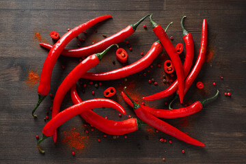 Wall Mural - Concept of hot and spicy ingredients - red hot chili pepper