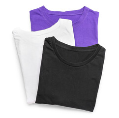 Folded stylish t-shirts on white background