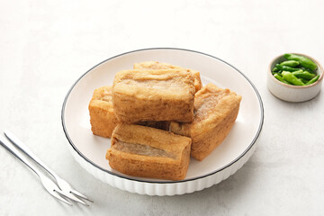 Wall Mural - Tahu Bakso, made from tofu filled with meatball dough, served with chili. Indonesian traditional food 
