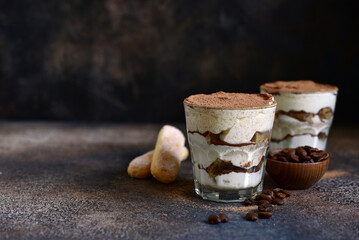 Wall Mural - Tiramisu - italian dessert with mascarpone , biscuit and coffee.