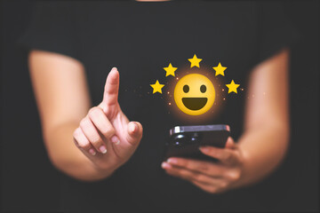 Customer pressing satisfaction with gold five star rating feedback icon and press level excellent rank for giving best score point to review the service , experience success business rate  concept.