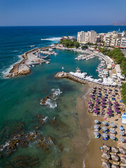 Canvas Print - Aerial view of the marina at the bustling tourist resort of Nea Chora in Chania, Crete, Greece