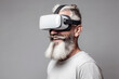 © ADDICTIVE STOCK - Generative AI image of bearded senior male happy in VR goggles experiencing virtual reality world against gray background