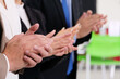 © krongthip - business team clapping hands to congratulate Work as a team.