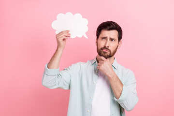 Photo of intellectual young man touch chin thoughtful looking paper bubble phrase ponder brainstorming isolated on pink color background