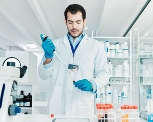 Wall Mural - you have to be cautious but meticulous. shot of a young scientist working with samples in a lab.