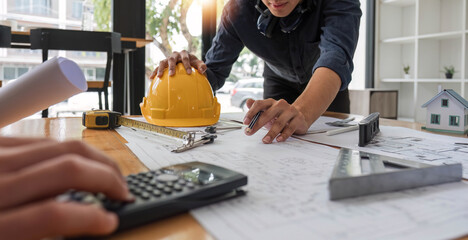 Wall Mural - Engineer Teamwork Meeting, Drawing working on blueprint meeting for project working with partner on model building and engineering tools in working site, Construction and structure concept..