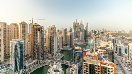  Panorama showing various skyscrapers in tallest recidential block in Dubai Marina aerial timelapse
