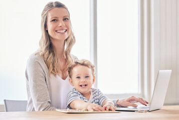 Poster - We have our work put out for us. Shot of a woman working on her laptop while keeping her baby on her lap.