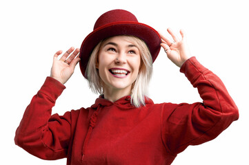 Smiling woman. Beautifu youngl woman wearing red hat and in a red sweatshirt.