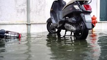 City Experiences High-water Level Covering Parking With Bike