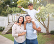 © Lumeez I/peopleimages.com - The two special people in my life. Shot of a beautiful family having fun with their daughter in their backyard at home.