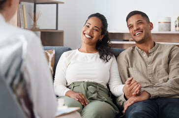 Aufkleber - Were doing so well. Shot of a happy young couple sitting together during a consultation with a psychologist.
